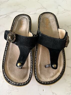 Alegria Black Suede Thong Sandals with Decorative Concho